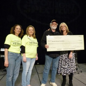 Sandy Simpson presenting check to The Veterans Foundation